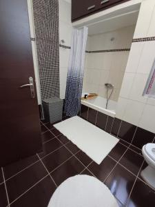 Koupelna v ubytování Sea Apartment