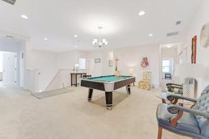 a living room with a pool table in it at Spacious King, Queen Rooms in Luxury Villa-Pool-SPA-Disney-WiFi-Smart TV in Davenport