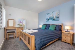 Ένα ή περισσότερα κρεβάτια σε δωμάτιο στο Southwood Cottage Newgale +30 φωτογραφίες