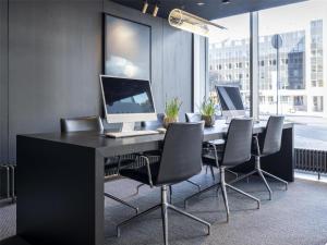 A television and/or entertainment centre at Radisson Collection Hotel, Tallinn