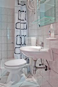 Ένα μπάνιο στο apartman leo