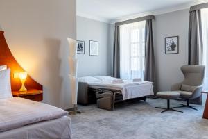 Voodi või voodid majutusasutuse Grandhotel Zvon toas