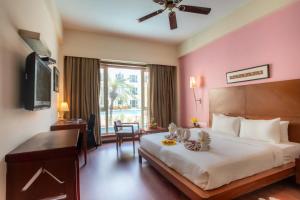 Ein Bett oder Betten in einem Zimmer der Unterkunft The Sky Imperial, Jaipur