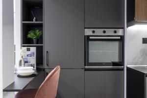 Eldhús eða eldhúskrókur á Aether Luxe Suite