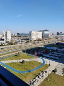 an aerial view of a parking lot in a city at New Luxury Suite with Garrage in Belgrade