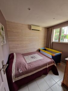 Posteľ alebo postele v izbe v ubytovaní Pavillon 3 chambres dans résidence avec piscine