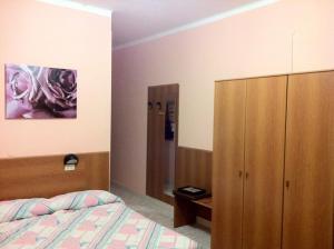 Кровать или кровати в номере Hotel Milanesina