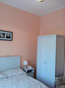 Кровать или кровати в номере Hotel Milanesina