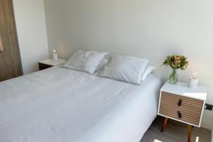 Postel nebo postele na pokoji v ubytování Suite Barrio Italia