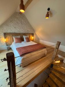 Postel nebo postele na pokoji v ubytování Au Détour des Châteaux