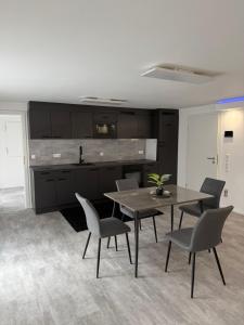 Kuchyň nebo kuchyňský kout v ubytování TheCornerLoft + 6 fotografií