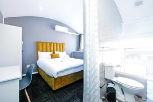 Katil atau katil-katil dalam bilik di 61 on Wale Backpackers
