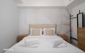 Luxury Apartments And Studios At Sea Side By Rently客房内的一张或多张床位