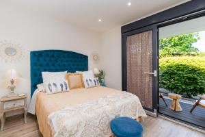 Posteľ alebo postele v izbe v ubytovaní Norte de Santillana Villas - Apartamentos