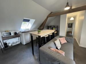 Kuchyň nebo kuchyňský kout v ubytování La campagne près de la ville