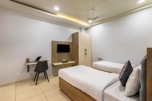 Postel nebo postele na pokoji v ubytování Wandr Hotel Medicity Gurugram, Near Medanta Hospital