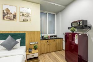Kuchyň nebo kuchyňský kout v ubytování Wandr Hotel Medicity Gurugram, Near Medanta Hospital