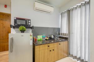 Kuchyň nebo kuchyňský kout v ubytování Wandr Hotel Medicity Gurugram, Near Medanta Hospital