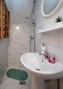 Koupelna v ubytování Apartmani Điran
