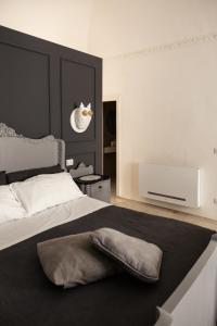 Letto o letti in una camera di Bianko EcoChic