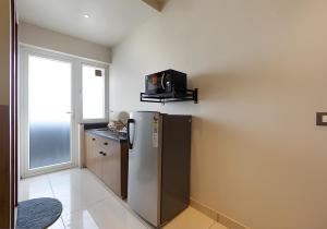 Kuchyň nebo kuchyňský kout v ubytování Wandr Hotel Medicity Gurugram, Near Medanta Hospital