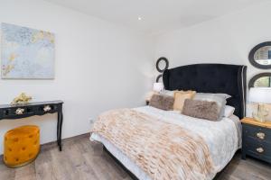 Posteľ alebo postele v izbe v ubytovaní Norte de Santillana Villas - Apartamentos