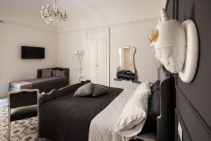 Letto o letti in una camera di Bianko EcoChic