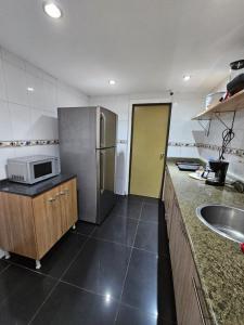 Kuchyň nebo kuchyňský kout v ubytování Gabriel House 6