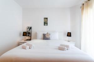 Ένα ή περισσότερα κρεβάτια σε δωμάτιο στο Villa Moinhos da Costa +31 φωτογραφίες