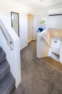 Ένα ή περισσότερα κρεβάτια σε δωμάτιο στο Stunning Mount Albert 2 Bed