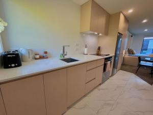 Η κουζίνα ή μικρή κουζίνα στο Sunny Stylish City Unit
