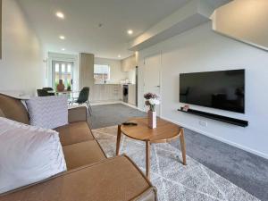 Et tv og/eller underholdning på Perfectly Cosy Riccarton 2BR Abode