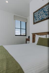Postel nebo postele na pokoji v ubytování Hotel La Estación