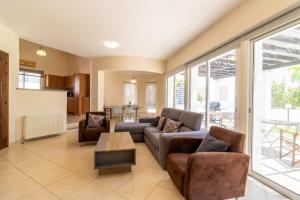 Posezení v ubytování Bungalow Yanna