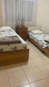 Postel nebo postele na pokoji v ubytování Bungalow Yanna + 11 fotografií