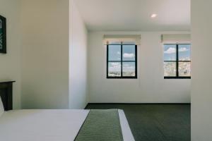Postel nebo postele na pokoji v ubytování Hotel La Estación