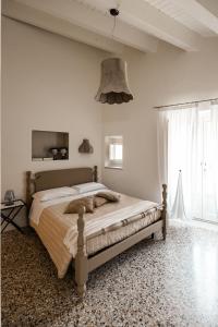 Letto o letti in una camera di Bianko EcoChic