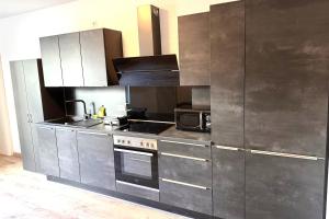 Kuchyň nebo kuchyňský kout v ubytování ProStays Apartment in Stolberg- 3 Schlafzimmer - 4 Betten