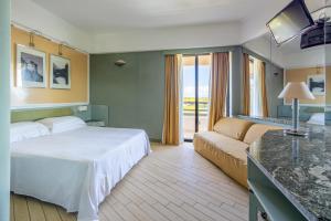 Postel nebo postele na pokoji v ubytování Circeo Park Hotel + 37 fotografií