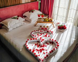 MAGNIFIQUE HOTEL客房内的一张或多张床位
