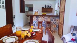 Η κουζίνα ή μικρή κουζίνα στο RES FLATS ANGELIM III - 2 QUARTOS Com AR no Centro