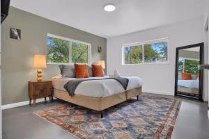 a bedroom with a large bed and a mirror at 175 Casa Buena Blanca in Miami +34 photos