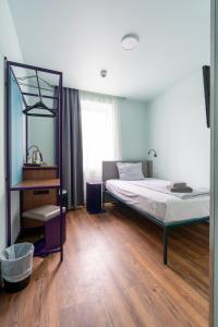 Postel nebo postele na pokoji v ubytování Das Schreder Hotel
