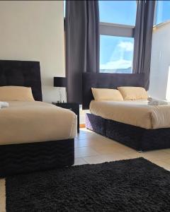 Postel nebo postele na pokoji v ubytování Ballycrystal House Getaway
