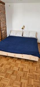Postel nebo postele na pokoji v ubytování Ferienhaus mit Garten Bodensee nah