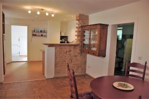 Kuchyň nebo kuchyňský kout v ubytování Ferienhaus mit Garten Bodensee nah + 6 fotografií