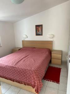 Postel nebo postele na pokoji v ubytování Apartmani Šehović