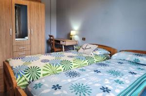 Posteľ alebo postele v izbe v ubytovaní Rocca View Apartment