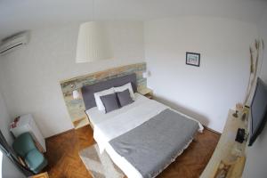 Łóżko lub łóżka w pokoju w obiekcie Guest house Mediterranea