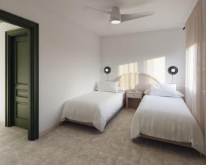 A bed or beds in a room at Apartamentos Princesa Guayadeque